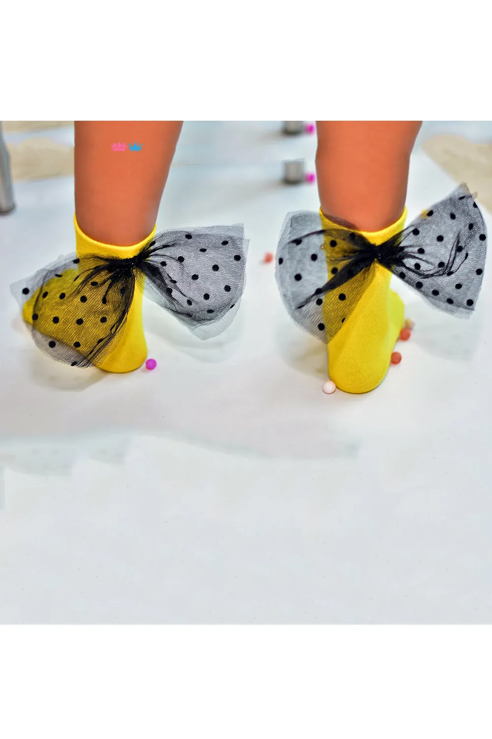 Yellow embellished black bow socks