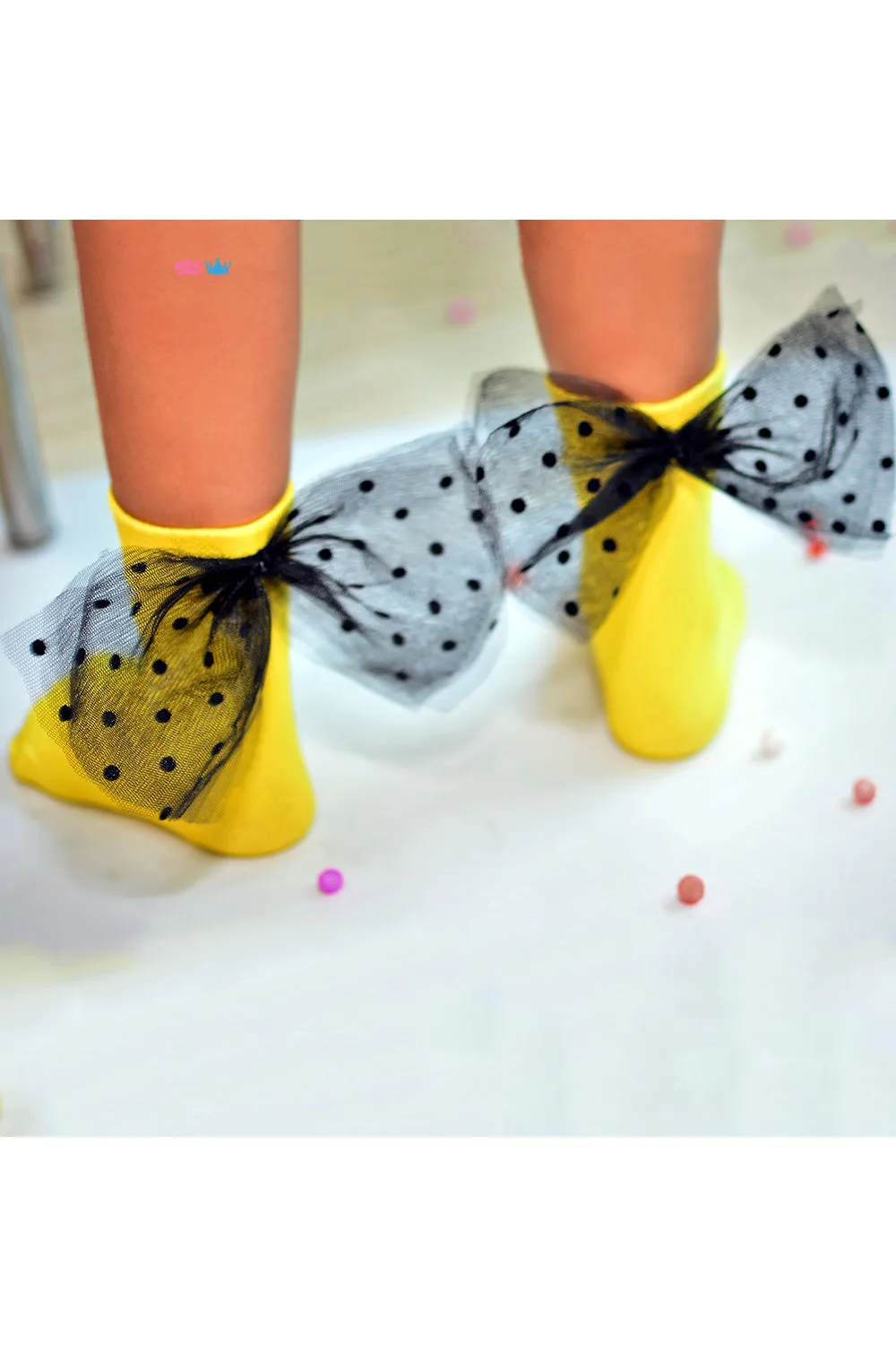 Yellow embellished black bow socks